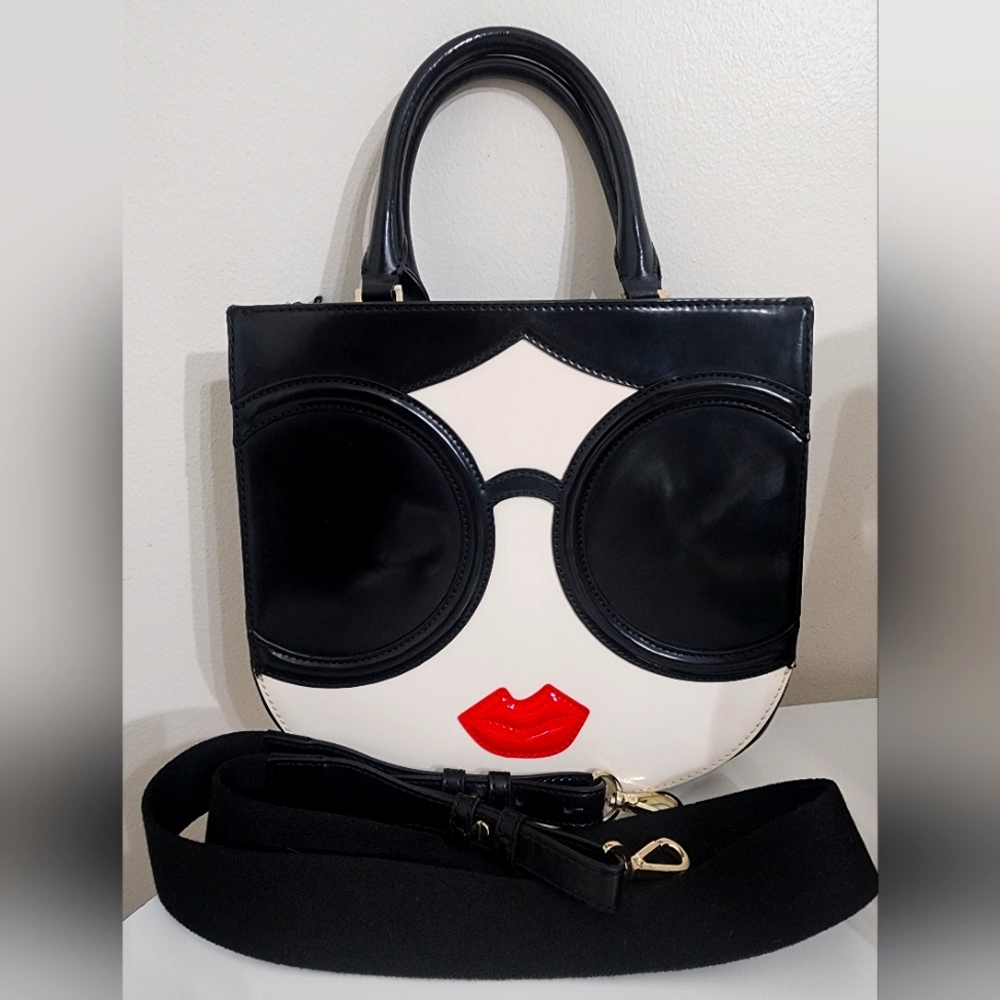 Alice + Olivia handbag with shoulder strap.